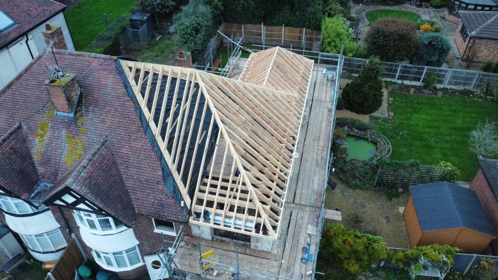 Timber dormer construction on pitched roof by carpenters in Nottingham.